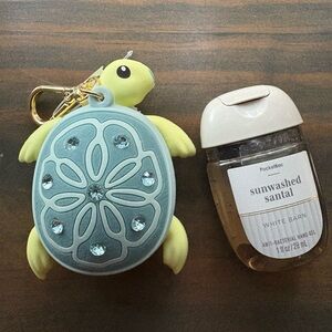 Bath and Body Works Sea Turtle PocketBac holder +Sunwashed Santal hand sanitizer